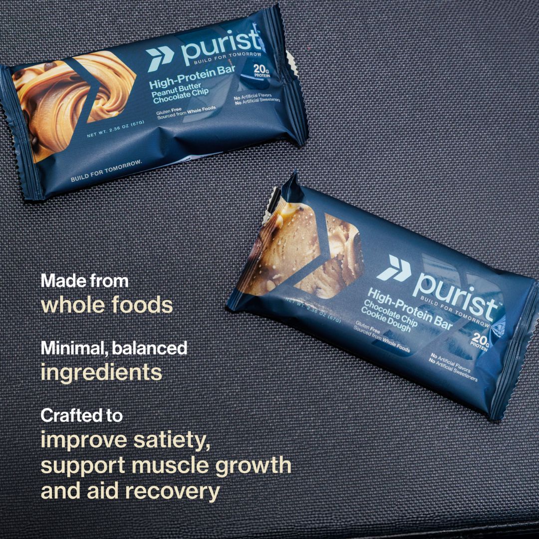 Two purist high-protein bars on a textured surface with product details.