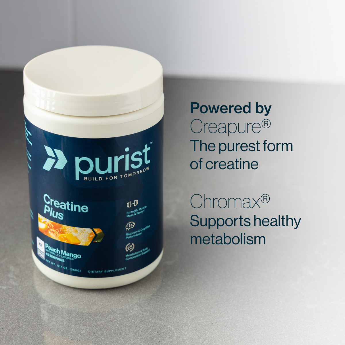 Purist Creatine Plus supplement container on a gray surface with text about Creapure (the purest form of creatine) and Chromax (supports health metabolism).