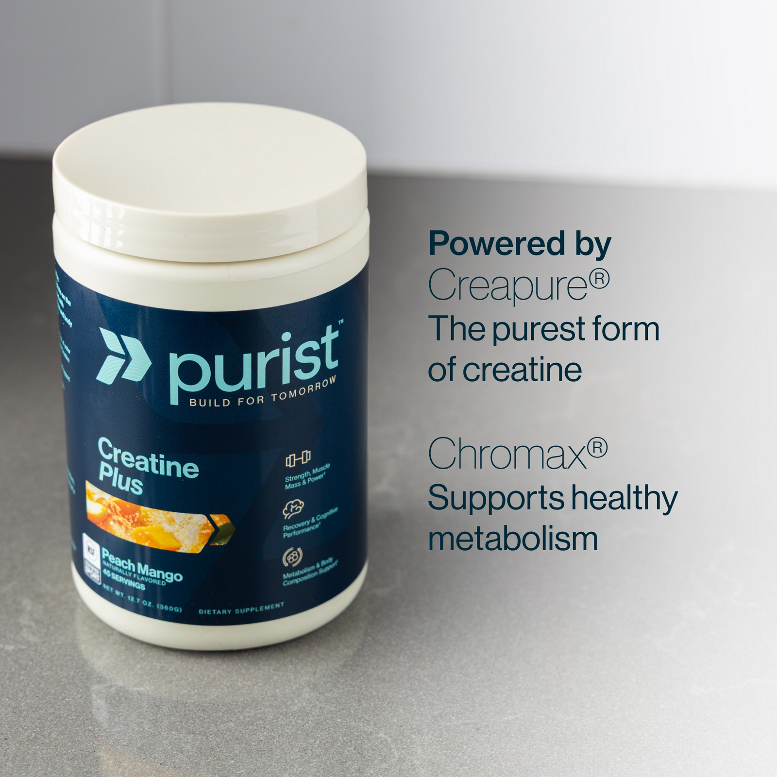Purist Creatine Plus supplement container on a gray surface with text about Creapure (the purest form of creatine) and Chromax (supports health metabolism).